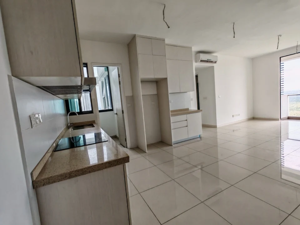 Macrolink Type H kitchen and living area in an unfurnished unit
