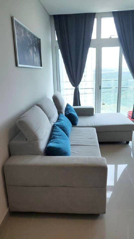 1Medini — Living area with sofa