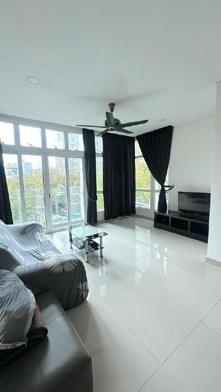 1Medini — Living area with balcony windows