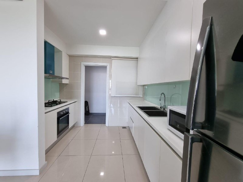 Iskandar Residences — Kitchen with cabinets and appliances